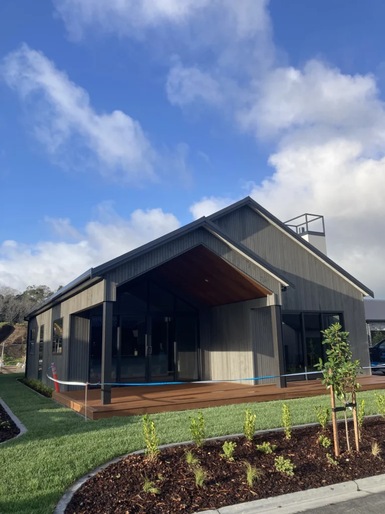 Completed Bethlehem Shores home with dark cladding and a timber deck