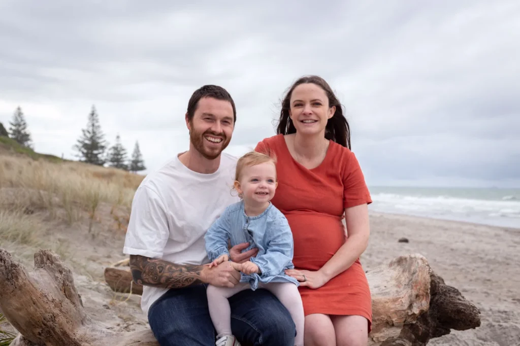 Kate Gerrard, TK Homes business administrator, with her family at the beach