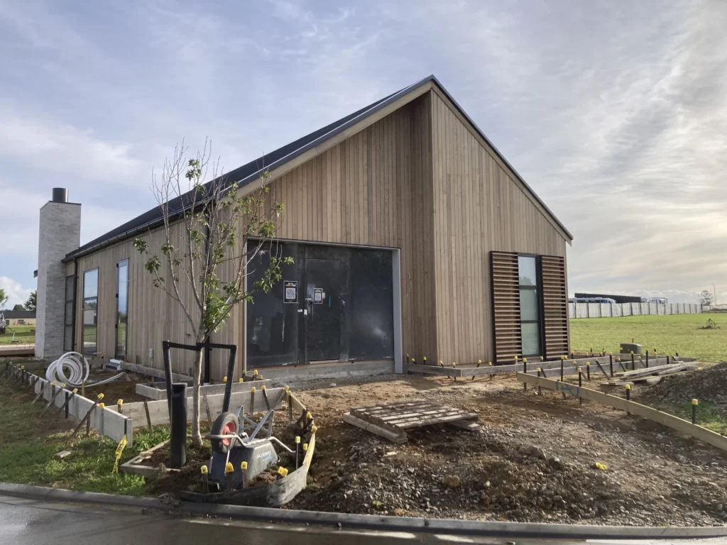 Omokoroa Country Club home with vertical cedar cladding nearing completion